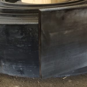 Reinforced rubber strip